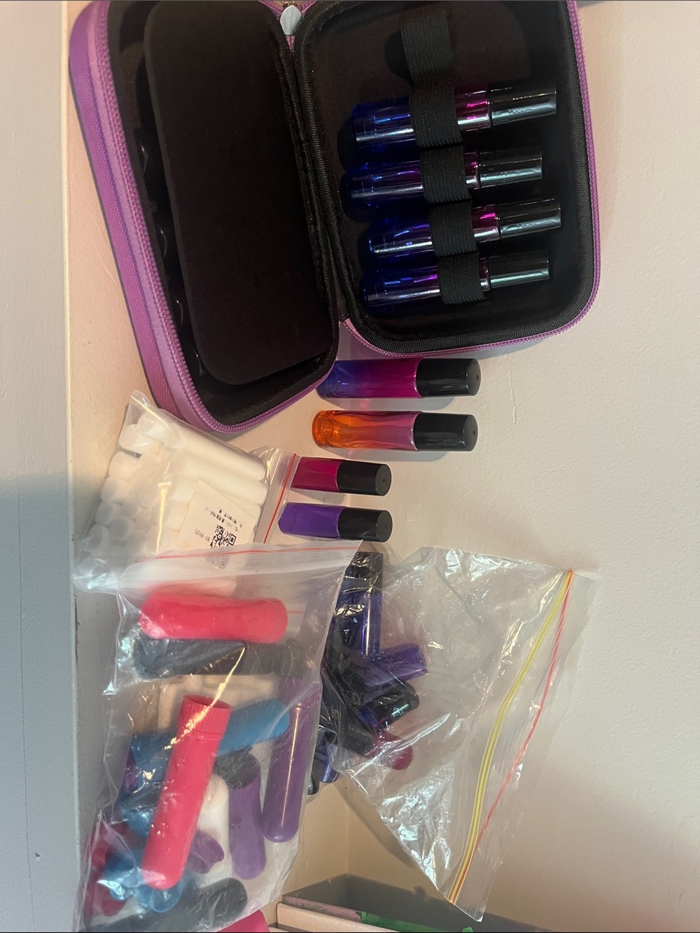 Never used roll-on bottle and carrier for essential oil